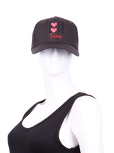 Load image into Gallery viewer, The Black Hat LLT Logo Holey Back with the &quot;Love Love Tennis&quot; Logo and holey back is a stylish and functional accessory designed for tennis enthusiasts who want to combine fashion with functionality on the court. The hat is primarily black, which gives it a sleek and versatile appearance, making it suitable for various tennis outfits. At the front of the hat, prominently displayed, is the &quot;Love Love Tennis&quot; logo. 
